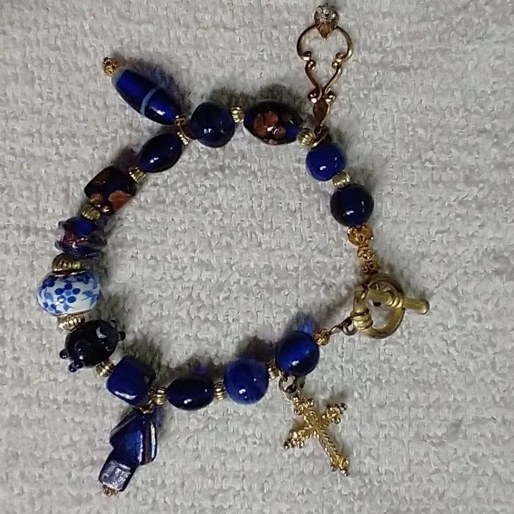 Goldtone blue glass beaded crystal cross toggle wire Bracelet